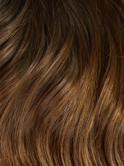Close-up of brown hair with a wavy texture